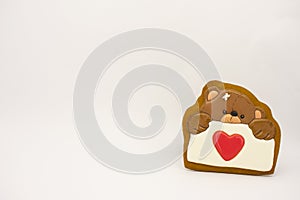 Gift for Valentine`s Day. Original gingerbread, a bear with a heart