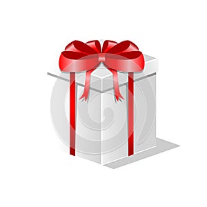 A gift in a white square box with a red bow