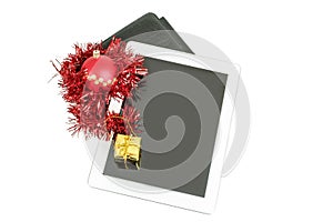 Gift white tablet with Christmas ball, box and red chain