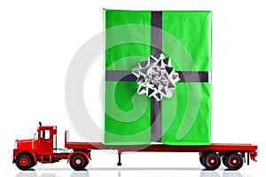 Gift wrapped present being delivered by truck