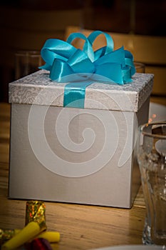 Gift for You with blue bow gray box