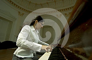 Gifted Pianist at the Piano photo