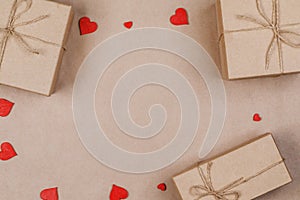 Gifts in craft paper and red hearts