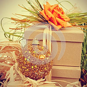 Gifts decorated with natual ornaments and christmas ball, with r