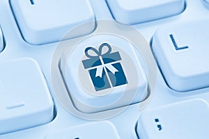 Gifts gift present online shopping ordering internet shop concept blue computer keyboard