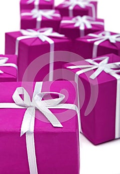 Gifts in magenta paper isolate