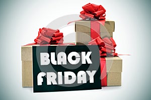 Gifts and a signboard with the text black friday