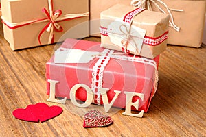 Gifts for Valentine's Day. Decorative boxes and felt hearts