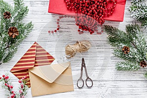 Gifts wrapping set with envelopes for new year and christmas 2018 greeting on wooden background top veiw