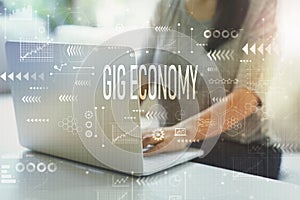 Gig economy with woman using laptop photo