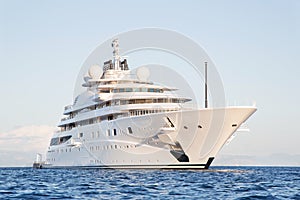 Gigantic big and large luxury mega or super motor yacht on the o