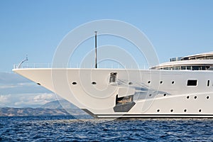 Gigantic big and large luxury mega or super motor yacht on the o