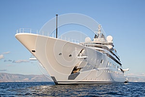 Gigantic big and large luxury mega or super motor yacht on the o