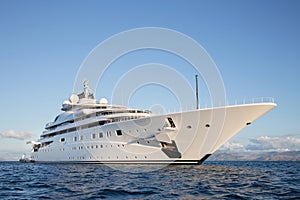 Gigantic big and large luxury mega or super motor yacht on the o