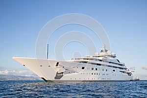 Gigantic big and large luxury mega or super motor yacht on the o
