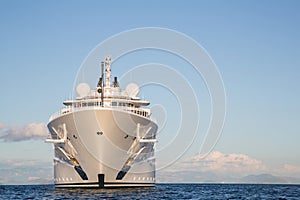 Gigantic big and large luxury mega or super motor yacht on the o