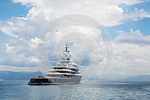 Gigantic big and large luxury mega yacht with helicopter landing