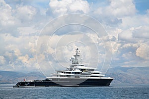 Gigantic big and large luxury mega yacht with helicopter landing