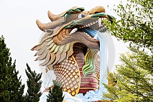 The gigantic chinese dragon in China town, on blue sky background, Thailand