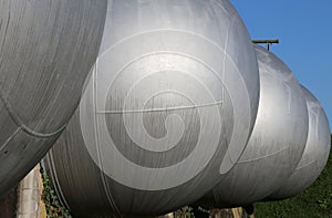Gigantic steel cylinders in the storage of flammable materials o