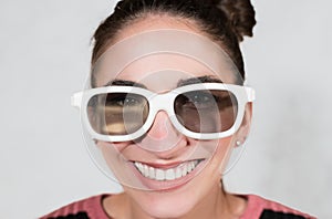 Giggly laughing face with 3d white eyeglasses