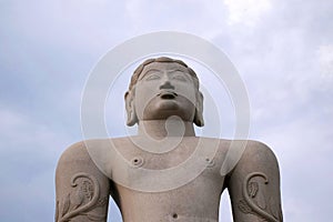 A gigiantic monolithic statue of Bahubali, also known as Gomateshwara, Vindhyagiri Hill, Shravanbelgola, Karnataka. View from the photo
