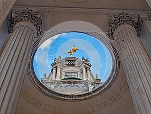 The gilded bronze figure of Ariel on top of the Bank of England