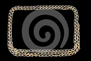 Gilded chainlet on a black background