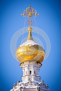 Gilded dome of a Christian temple a background of b