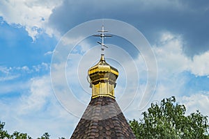 Gilded dome with a cross of the Orthodox Church.