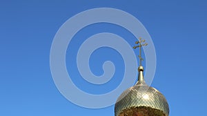 Orthodox dome with a cross on the roof of the church