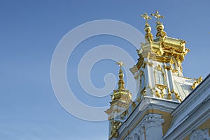 Gilded domes of orthodox church on a background dark blue sky