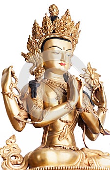 Gilded form of Avalokiteshvara made of metal on white background