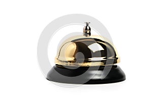 Gilded hotel service bell on a white background, isolate