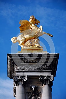 Gilded Pegasus sculpture on the column of Alexandre III bridge