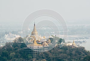 Gilded roof of Buddhist pagoda in Mandalay, Myanmar