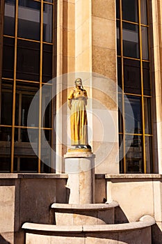 Gilded statue of a woman on the Palais de Chaillot, Place du Trocadero, Paris