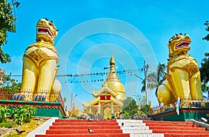 The gilt lions of Mahavijaya Pagoda, Yangon, Myanmar
