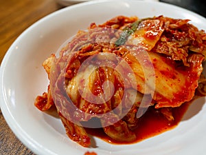 Gimchi or Kimchi is traditional fermented Korean side dish made of vegetables, famous Korean foods photo