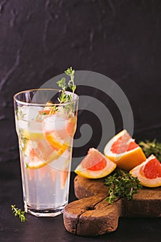 Gin bitter lemon with thyme and grapefruit. Fruit lemonade.