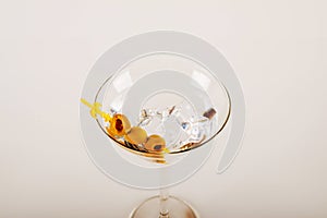 Gin with vermouth in a glass on a white background, classic