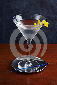 Gin or Vodka Martini Cocktail with Lemon Twist in Martini Glass