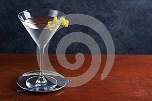 Gin or Vodka Martini Cocktail with Lemon Twist in Martini Glass