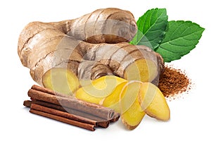 Giner root next to pile of cinnamon sticks, rama tulsi leaves and  ground cinnamon isolated