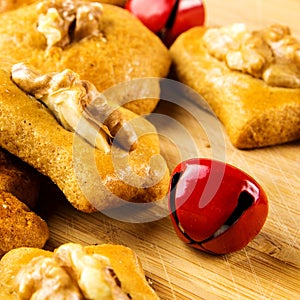 Ginger bread cakes closeup with jingle bells