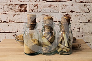 Ginger on a brick wall in a jar