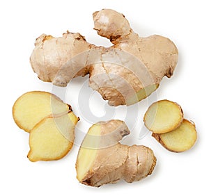 Ginger cut into pieces on a white background.Top view