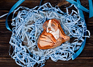 Ginger and delicious gingerbread in the form of a formula one car on a glossy board