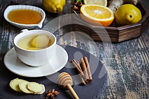 Ginger hot immunity boosting Vitamin natural drink With citrus, honey and cinnamon and ingredients