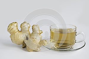 Ginger hot tea cup and leaf on white background